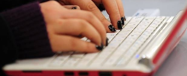 young person typing